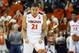 CHARLOTTESVILLE, VA - MARCH 3: Isaiah Wilkins #21 of the Virginia Cavaliers cheers in the second half during a game against the Notre Dame Fighting Irish at John Paul Jones Arena on March 3, 2018 in Charlottesville, Virginia. Virginia defeated Notre Dame