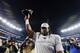 FOXBOROUGH, MA - JANUARY 21: Ricky Jean Francois #94 of the New England Patriots celebrates with the Lamar Hunt trophy after winning the AFC Championship Game against the Jacksonville Jaguars at Gillette Stadium on January 21, 2018 in Foxborough, Massach