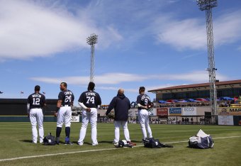LAKELAND, FL - MARCH 07: Leonys Martin #12 of the Detroit Tigers Miguel Cabrera #24, Edwin Espinal #74 and Nicholas Castellanos #9 stand for the playing of the National Anthem before the Spring Training game against the Toronto Blue Jays at Joker Marchant