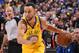 OAKLAND, CA - FEBRUARY 24: Stephen Curry #30 of the Golden State Warriors drives to the basket during the game against the Oklahoma City Thunder on February 24, 2018 at ORACLE Arena in Oakland, California. NOTE TO USER: User expressly acknowledges and agr