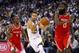 OAKLAND, CA - OCTOBER 17: Stephen Curry #30 of the Golden State Warriors drives on Chris Paul #3 and James Harden #13 of the Houston Rockets at ORACLE Arena on October 17, 2017 in Oakland, California. NOTE TO USER: User expressly acknowledges and agrees