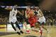 ORLANDO, FL - FEBRUARY 03: Rob Gray #32 of the Houston Cougars drives to the net against A.J. Davis #3 of the UCF Knights during a NCAA basketball game at the CFE Arena on February 3, 2018 in Orlando, Florida. (Photo by Alex Menendez/Getty Images)