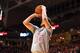 LUBBOCK, TX - FEBRUARY 24: Sviatoslav Mykhailiuk #10 of the Kansas Jayhawks shoots the ball from the corner during the game against the Texas Tech Red Raiders on February 24, 2018 at United Supermarket Arena in Lubbock, Texas. Kansas defeated Texas Tech 7