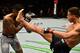 LONDON, ENGLAND - MARCH 17: (R-L) Tom Duquesnoy of France kicks Terrion Ware in their bantamweight bout inside The O2 Arena on March 17, 2018 in London, England. (Photo by Brandon Magnus/Zuffa LLC/Zuffa LLC via Getty Images)