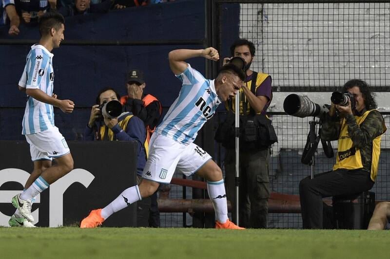 Argentina's Racing Club forward Lautaro Martinez (C) celebrates after scoring the team's second goal against Brazil's Cruzeiro during the Copa Libertadores 2018 Group E first leg football at Juan Domingo Peron stadium in Buenos Aires, Argentina, on Februa