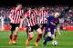 BARCELONA, SPAIN - MARCH 18: Andres Iniesta of FC Barcelona controls the ball under pressure from Unai Nunez and Oscar De Marcos of Athletic Club during the La Liga match between Barcelona and Athletic Club at Camp Nou on March 18, 2018 in Barcelona, Spai