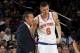 NEW YORK, NY - OCTOBER 21: Kristaps Porzingis #6 of the New York Knicks talks with head Coach Jeff Hornacek during a game at Madison Square Garden in New York City, New York on October 21, 2017. NOTE TO USER: User expressly acknowledges and agrees that,