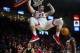 BOWLING GREEN, KY - JANUARY 27: Forward Justin Johnson #23 of the Western Kentucky Hilltoppers dunks the ball in a game against Marshall University at E.A. Diddle Arena on January 27, 2018 in Bowling Green, Ky. (Photo by Shaban Athuman/ Getty Images)
