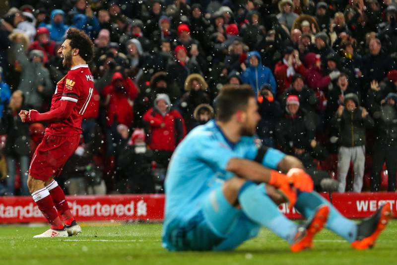 LIVERPOOL, ENGLAND - MARCH 17: Mohamed Salah of Liverpool celebrates after scoring a goal to make it 4-0 during the Premier League match between Liverpool and Watford at Anfield on March 17, 2018 in Liverpool, England. (Photo by Robbie Jay Barratt - AMA/G