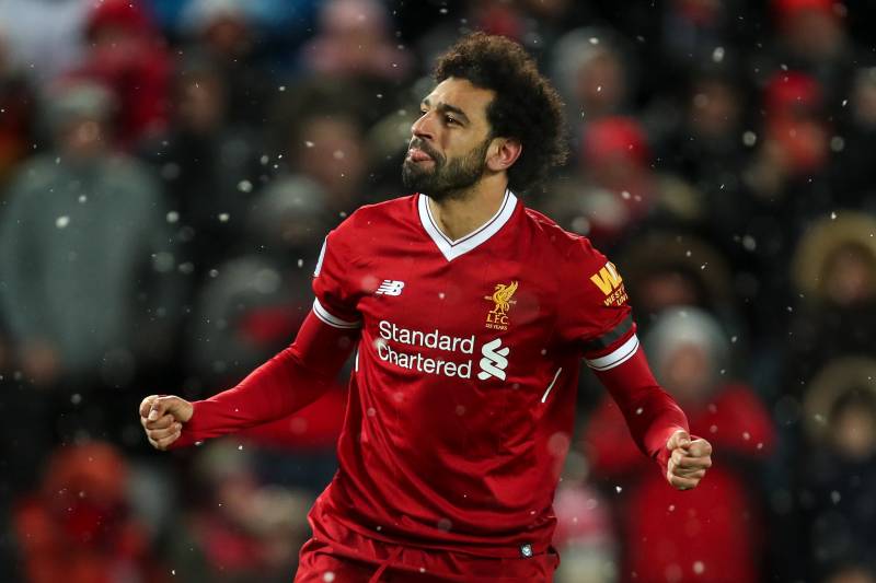 LIVERPOOL, ENGLAND - MARCH 17: Mohamed Salah of Liverpool celebrates after scoring a goal to make it 4-0 during the Premier League match between Liverpool and Watford at Anfield on March 17, 2018 in Liverpool, England. (Photo by Robbie Jay Barratt - AMA/G