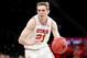 NEW YORK, NY - MARCH 27: Tyler Rawson #21 of the Utah Utes dribbles towards the basket in the first quarter against the Western Kentucky Hilltoppers during their 2018 National Invitation Tournament Championship semifinals game at Madison Square Garden on
