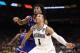 SAN ANTONIO, TX - MARCH 31: Devonte' Graham #4 of the Kansas Jayhawks competes for position with Jalen Brunson #1 of the Villanova Wildcats in the second half during the 2018 NCAA Men's Final Four Semifinal at the Alamodome on March 31, 2018 in San Anton
