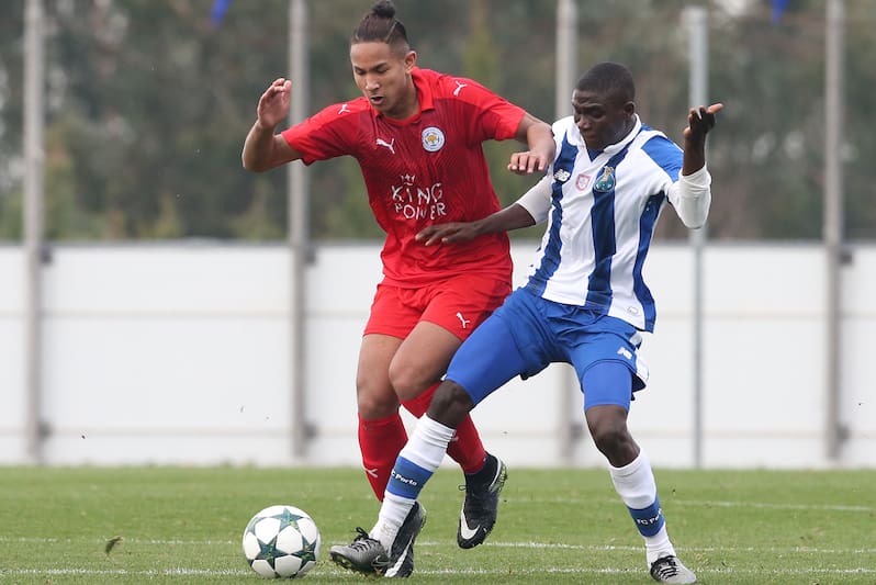 OLIVAL, PORTUGAL - DECEMBER 7: FC Porto's forward James Artur (R) with Faiq Bolkiah of Leicester City FC (L) in action during the UEFA Youth Champions League match between FC Porto and Leicester City FC at Centro de Estagios do Olival on December 7, 2016