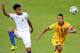 Faiq (right) in action for Brunei