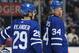 TORONTO, ON - APRIL 2: William Nylander #29 and Auston Matthews #34 of the Toronto Maple Leafs chat during a timeout against the Buffalo Sabres during an NHL game at the Air Canada Centre on April 2, 2018 in Toronto, Ontario, Canada. The Maple Leafs defe