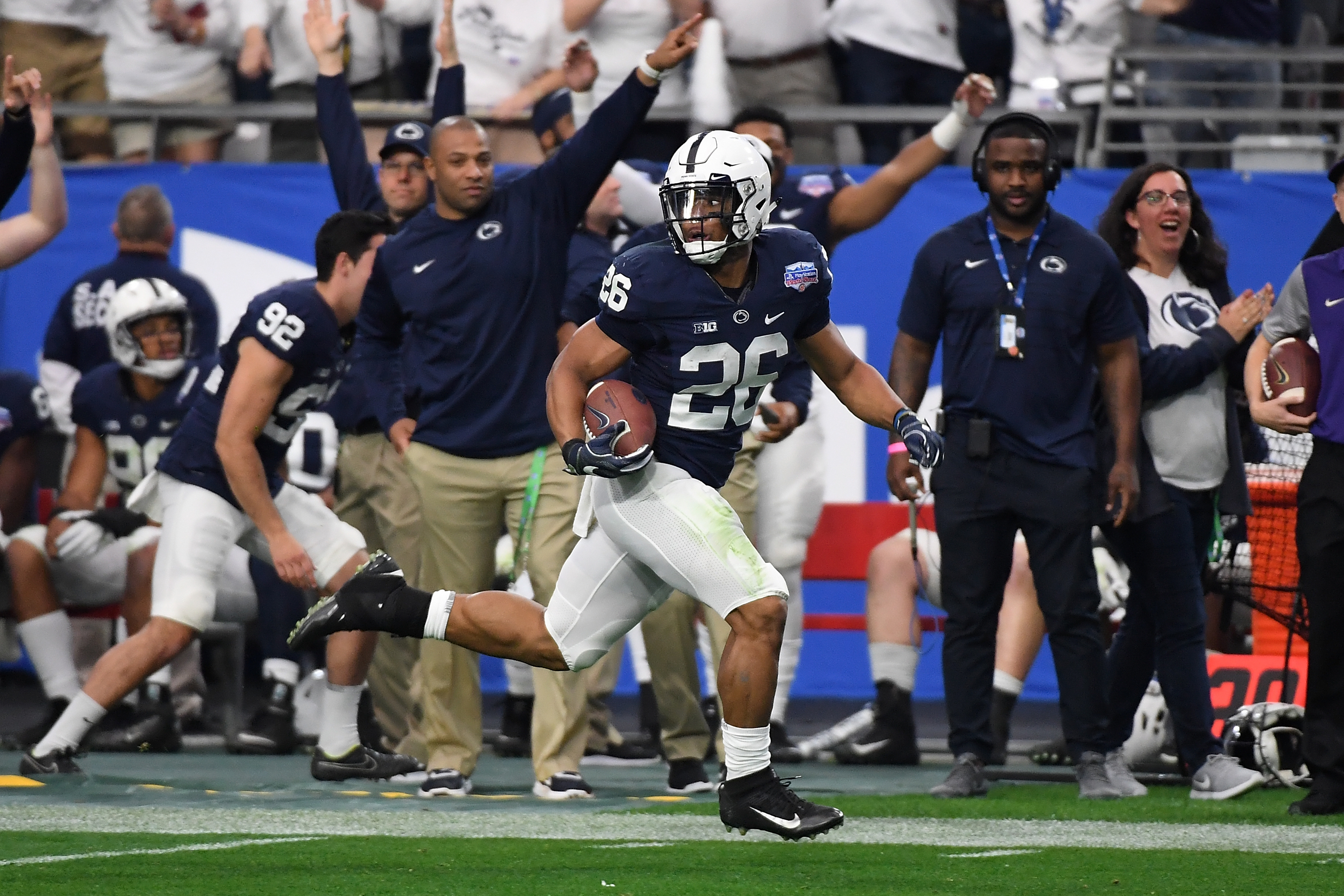 GLENDALE, AZ - DECEMBER 30: Saquon Barkley #26 of Penn State Nittany Lions rushes for a touchdown against the Washington Huskies during the Playstation Fiesta Bowl at University of Phoenix Stadium on December 30, 2017 in Glendale, Arizona. (Photo by Nor