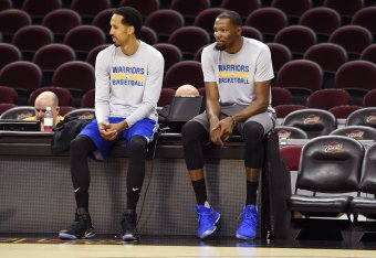 CLEVELAND, OH - JUNE 06:  Shaun Livingston #34 and Kevin Durant #35 of the Golden State Warriors looks on during practice and media availability as part of the 2017 NBA Finals on June 06, 2017 at Quicken Loans Arena in Cleveland, Ohio. NOTE TO USER: User 