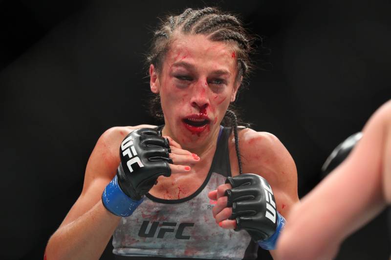 Joanna Jedrzejczyk near the end of her bout with Rose Namajunas at UFC 223.