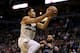 MILWAUKEE, WI - APRIL 09: Malcolm Brogdon #13 of the Milwaukee Bucks attempts a shot past D.J. Augustin #14 of the Orlando Magic in the second quarter at the Bradley Center on April 9, 2018 in Milwaukee, Wisconsin. NOTE TO USER: User expressly acknowledg