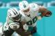 MIAMI GARDENS, FL - OCTOBER 22: Tight end Anthony Fasano of the Miami Dolphins catches a pass and fumbles as he is tackled by Darron Lee #58 of the New York Jets during a NFL game at Hard Rock Stadium on October 22, 2017 in Miami Gardens, Florida. (Phot