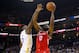 Bell guarding James Harden.