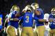 PASADENA, CA - NOVEMBER 11: Kolton Miller #77 and Scott Quessenberry #52 congratulate Josh Rosen #3 of the UCLA Bruins after his touchdown during the first half of a game against the Arizona State Sun Devils at the Rose Bowl on November 11, 2017 in Pasa
