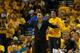 OAKLAND, CA - APRIL 18: Injured point guard Stephen Curry #30 of the Golden State Warriors supports his team from the bench in Game Two of the Western Conference Quarterfinals during the 2016 NBA Playoffs at ORACLE Arena on April 18, 2016 in Oakland, Cali