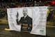 LONDON, ENGLAND - APRIL 14: A banner bearing a picture of Pep Guardiola the head coach / manager of Manchester City dressed as James Bond saying mind the gap during the Premier League match between Tottenham Hotspur and Manchester City at Wembley Stadium