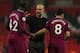LONDON, ENGLAND - APRIL 14: Yaya Toure of Manchester City and Manchester City manager Pep Guardiola and Ilkay Gundogan of Manchester City during the Premier League match between Tottenham Hotspur and Manchester City at Wembley Stadium on April 14, 2018 in