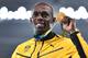 Jamaica's Usain Bolt holds his gold medal during the podium ceremony for the Men's 200m during the athletics event at the Rio 2016 Olympic Games at the Olympic Stadium in Rio de Janeiro on August 19, 2016. / AFP / FABRICE COFFRINI (Photo credit s Jamaica's Usain Bolt holds his gold medal during the podium ceremony for the Men's 200m during the athletics event at the Rio 2016 Olympic Games at the Olympic Stadium in Rio de Janeiro on August 19, 2016. / AFP / FABRICE COFFRINI (Photo credit s