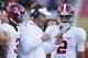FAYETTEVILLE, AR - OCTOBER 8: Offensive Coordinator Lane Kiffin talks with Jalen Hurts #2, Calvin Ridley #3 and David Cornwell #12 of the Alabama Crimson Tide during a game against the Arkansas Razorbacks at Razorback Stadium on October 8, 2016 in Fayett