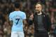 Manchester City's Spanish manager Pep Guardiola (R) gestures on the touchline to Manchester City's English midfielder Raheem Sterling (L) during the English Premier League football match between Manchester City and Bournemouth at the Etihad Stadium in Man