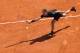 TOPSHOT - Austria's Dominic Thiem returns the ball to Russia's Andrey Rublev during their tennis match as part of the Monte-Carlo ATP Masters Series Tournament, on April 17, 2018 in Monaco. / AFP PHOTO / VALERY HACHE (Photo credit should read VALER