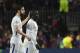 Chelsea's Spanish midfielder Cesc Fabregas and Chelsea's French midfielder N'Golo Kante (R) react at the end of the UEFA Champions League round of sixteen second leg football match between FC Barcelona and Chelsea FC at the Camp Nou stadium in Barcelona o
