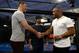 Miocic (left) and Daniel Cormier (right)