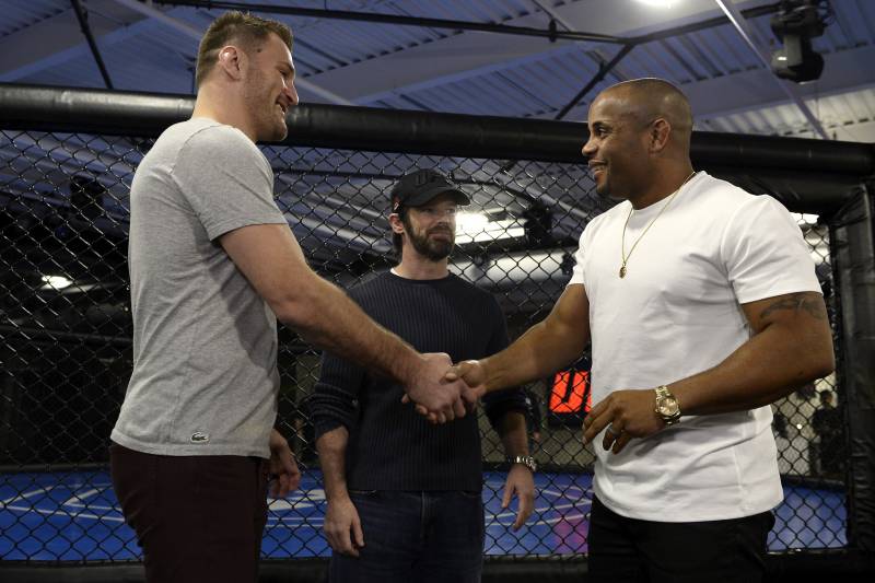Miocic (left) and Daniel Cormier (right)