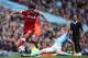 MANCHESTER, ENGLAND - SEPTEMBER 09: Mohamed Salah of Liverpool and Kevin De Bruyne of Manchester City during the Premier League match between Manchester City and Liverpool at Etihad Stadium on September 9, 2017 in Manchester, England. (Photo by Robbie Jay
