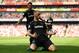 LONDON, ENGLAND - APRIL 22: Marko Arnautovic of West Ham United celebrates scoring his side's first goal with Manuel Lanzini during the Premier League match between Arsenal and West Ham United at Emirates Stadium on April 22, 2018 in London, England. (P