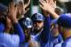 KANSAS CITY, MO - APRIL 11: Mike Moustakas #8 of the Kansas City Royals celebrates in the dugout after scoring a run in the fourth inning against the Seattle Mariners at Kauffman Stadium on April 11, 2018 in Kansas City, Missouri. (Photo by Brian Davidson