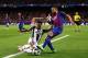 BARCELONA, SPAIN - APRIL 19: Jordi Alba of FC Barcelona is tackled by Dani Alves of Juventus during the UEFA Champions League Quarter Final second leg match between FC Barcelona and Juventus at Camp Nou on April 19, 2017 in Barcelona, Spain. (Photo by Ch