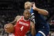 MINNEAPOLIS, MN - APRIL 21: PJ Tucker #4 of the Houston Rockets drives to the basket against Taj Gibson #67 of the Minnesota Timberwolves during the first quarter in Game Three of Round One of the 2018 NBA Playoffs on April 21, 2018 at the Target Center i