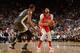OAKLAND, CA - APRIL 7: Anthony Davis #23 of the New Orleans Pelicans prepares to shoot the ball against Kevin Durant #35 of the Golden State Warriors on April 7, 2018 at ORACLE Arena in Oakland, California. NOTE TO USER: User expressly acknowledges and a