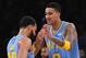 LOS ANGELES, CA - APRIL 04: Tyler Ennis #10 gets a high five from Kyle Kuzma #0 of the Los Angeles Lakers after a 3 point basket in the second half of the game against the San Antonio Spurs at Staples Center on April 4, 2018 in Los Angeles, California. NO
