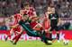 MUNICH, GERMANY - APRIL 25: Javier Martinez of FC Bayern Muenchen battles for the ball with Casemiro of Real Madrid during the UEFA Champions League Semi Final First Leg match between Bayern Muenchen and Real Madrid at the Allianz Arena on April 25, 2018