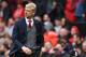 Arsenal's French manager Arsene Wenger leaves the pitch after the English Premier League football match between Manchester United and Arsenal at Old Trafford in Manchester, north west England, on April 29, 2018. - Manchester United won the game 2-1. (Phot