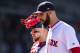 BOSTON, MA - APRIL 5: David Price #24 of the Boston Red Sox reacts with Christian Vazquez #7 during the fifth inning of the Opening Day game against the Tampa Bay Rays on April 5, 2018 at Fenway Park in Boston, Massachusetts. (Photo by Billie Weiss/Boston
