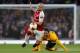 LONDON, ENGLAND - APRIL 26: Sime Vrsaljko of Atletico Madrid tackles Jack Wilshere of Arsenal during the UEFA Europa League Semi Final leg one match between Arsenal FC and Atletico Madrid at Emirates Stadium on April 26, 2018 in London, United Kingdom.