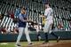 Jonny Venters hands the ball to Rays manager Kevin Cash after retiring Chris Davis.