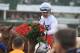 LOUISVILLE, KY - MAY 05: Jockey Mike Smith celebrates atop of Justify #7 after winning the 144th running of the Kentucky Derby at Churchill Downs on May 5, 2018 in Louisville, Kentucky. (Photo by Sean M. Haffey/Getty Images)