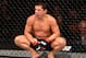 Joseph Benavidez recovers from an unintentional low blow by Henry Cejudo in December 2016.